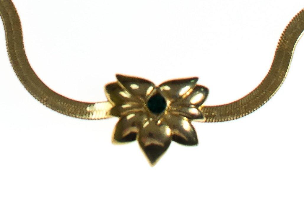 Vintage Barbara Mandrell Gold Slide Pendant with Emerald Crystal Long Gold Serpentine Chain Necklace by Barbara Mandrell - Vintage Meet Modern Vintage Jewelry - Chicago, Illinois - #oldhollywoodglamour #vintagemeetmodern #designervintage #jewelrybox #antiquejewelry #vintagejewelry