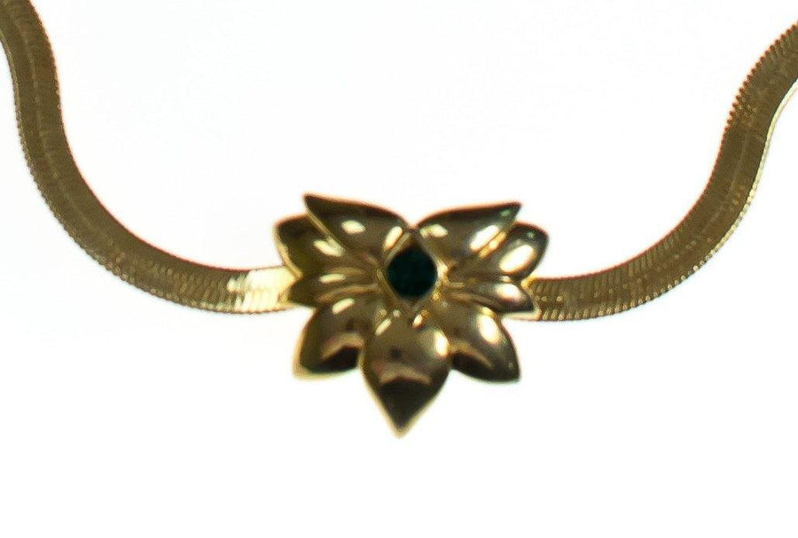 Vintage Barbara Mandrell Gold Slide Pendant with Emerald Crystal Long Gold Serpentine Chain Necklace by Barbara Mandrell - Vintage Meet Modern Vintage Jewelry - Chicago, Illinois - #oldhollywoodglamour #vintagemeetmodern #designervintage #jewelrybox #antiquejewelry #vintagejewelry