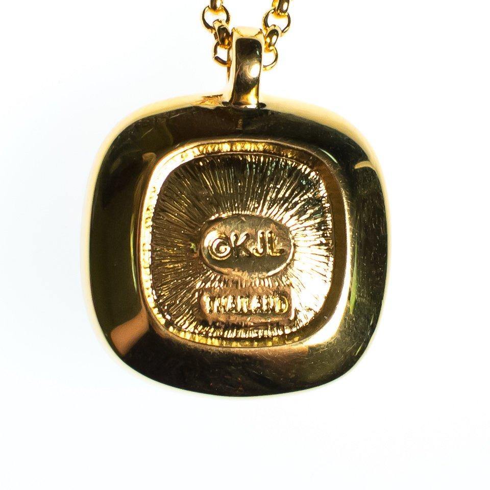 Vintage Kenneth Jay Lane Necklace and Pendant, Pink Rhinestones, Purple Rhinestones, Clear Rhinestones, Gold Tone Necklace, Lobster Clasp by Kenneth Jay Lane - Vintage Meet Modern Vintage Jewelry - Chicago, Illinois - #oldhollywoodglamour #vintagemeetmodern #designervintage #jewelrybox #antiquejewelry #vintagejewelry