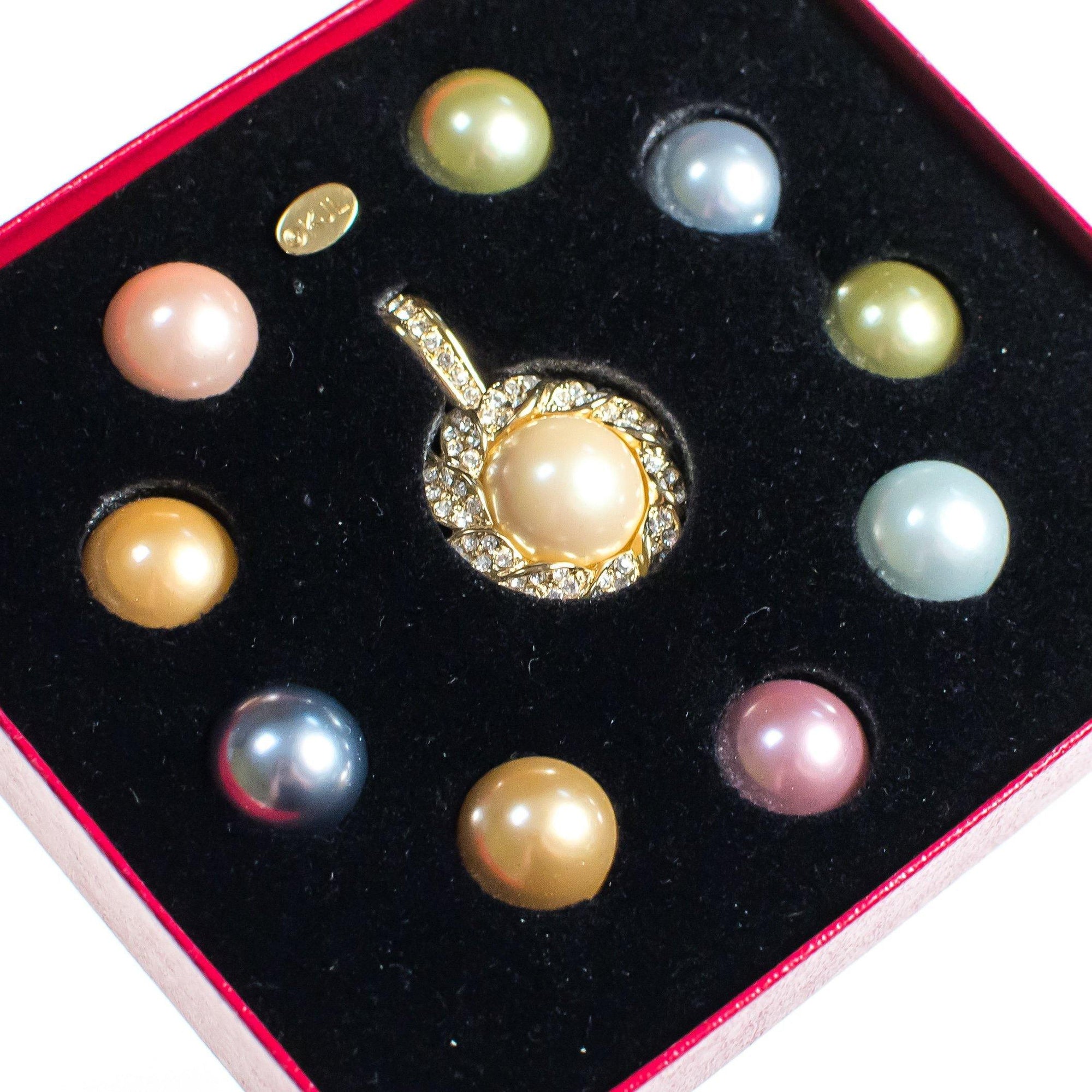 Vintage Kenneth Jay Lane Pendant Pastel Interchangeable Faux Pearls, Diamante Crystals, Gold Tone Setting by Kenneth Jay Lane - Vintage Meet Modern Vintage Jewelry - Chicago, Illinois - #oldhollywoodglamour #vintagemeetmodern #designervintage #jewelrybox #antiquejewelry #vintagejewelry