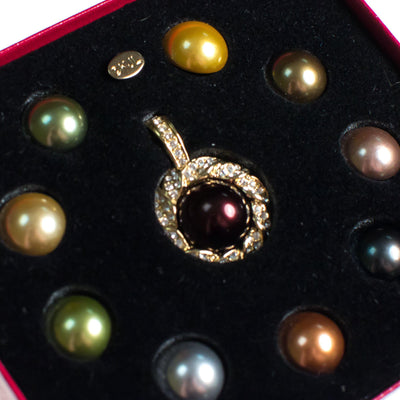 Vintage Kenneth Jay Lane Pendant, Black Pearl, Earth Tone Interchangeable Faux Pearls, Diamante Crystals, Gold Tone Setting by Kenneth Jay Lane - Vintage Meet Modern Vintage Jewelry - Chicago, Illinois - #oldhollywoodglamour #vintagemeetmodern #designervintage #jewelrybox #antiquejewelry #vintagejewelry