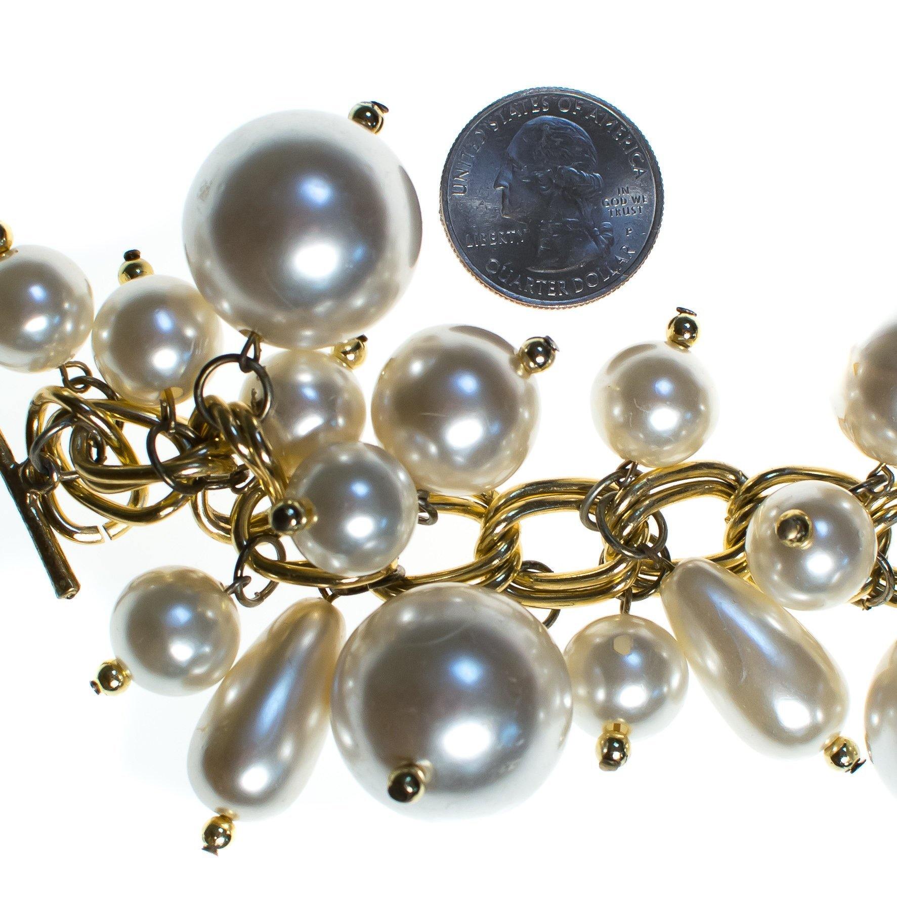 Vintage 1960s Huge Pearl Bauble Charm Bracelet Bracelet, Gold Tone Setting, Round and Tear Drop Faux Pearls, Toggle Clasp by 1960s - Vintage Meet Modern Vintage Jewelry - Chicago, Illinois - #oldhollywoodglamour #vintagemeetmodern #designervintage #jewelrybox #antiquejewelry #vintagejewelry