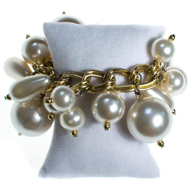 Vintage 1960s Huge Pearl Bauble Charm Bracelet Bracelet, Gold Tone Setting, Round and Tear Drop Faux Pearls, Toggle Clasp by 1960s - Vintage Meet Modern Vintage Jewelry - Chicago, Illinois - #oldhollywoodglamour #vintagemeetmodern #designervintage #jewelrybox #antiquejewelry #vintagejewelry