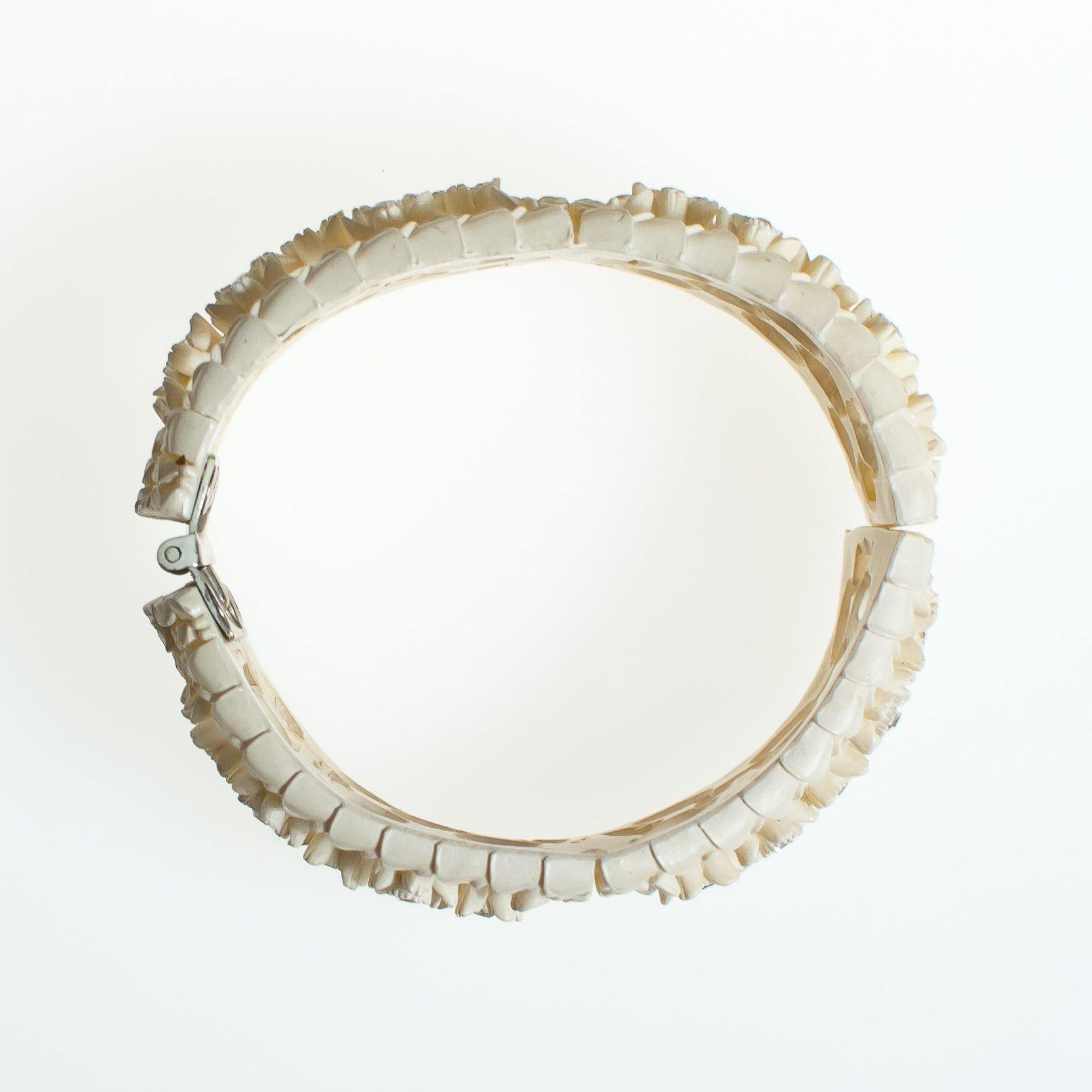 Vintage Ivory Cream Celluloide Flower Carved Hinged Clamper Bangle Bracelet with Rhinestones by Celluloide - Vintage Meet Modern Vintage Jewelry - Chicago, Illinois - #oldhollywoodglamour #vintagemeetmodern #designervintage #jewelrybox #antiquejewelry #vintagejewelry