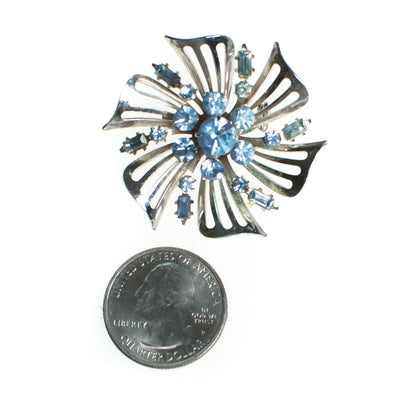 Vintage Coro Silver Pinwheel Brooch with Light Blue Rhinestones, Brooches and Pins by Coro - Vintage Meet Modern Vintage Jewelry - Chicago, Illinois - #oldhollywoodglamour #vintagemeetmodern #designervintage #jewelrybox #antiquejewelry #vintagejewelry