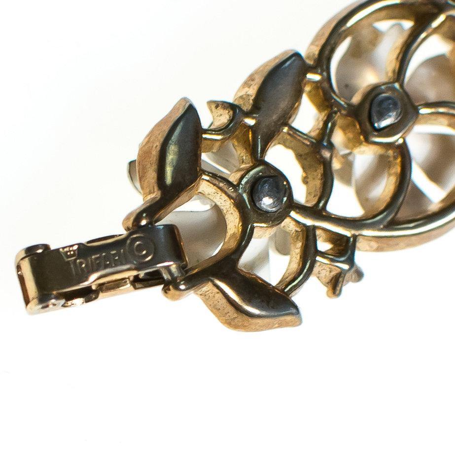 Vintage Crown Trifari White Flower with Rhinestones Bracelet, Gold Tone, White Flowers, CZ, Snap Lock Clasp by 1950s - Vintage Meet Modern Vintage Jewelry - Chicago, Illinois - #oldhollywoodglamour #vintagemeetmodern #designervintage #jewelrybox #antiquejewelry #vintagejewelry