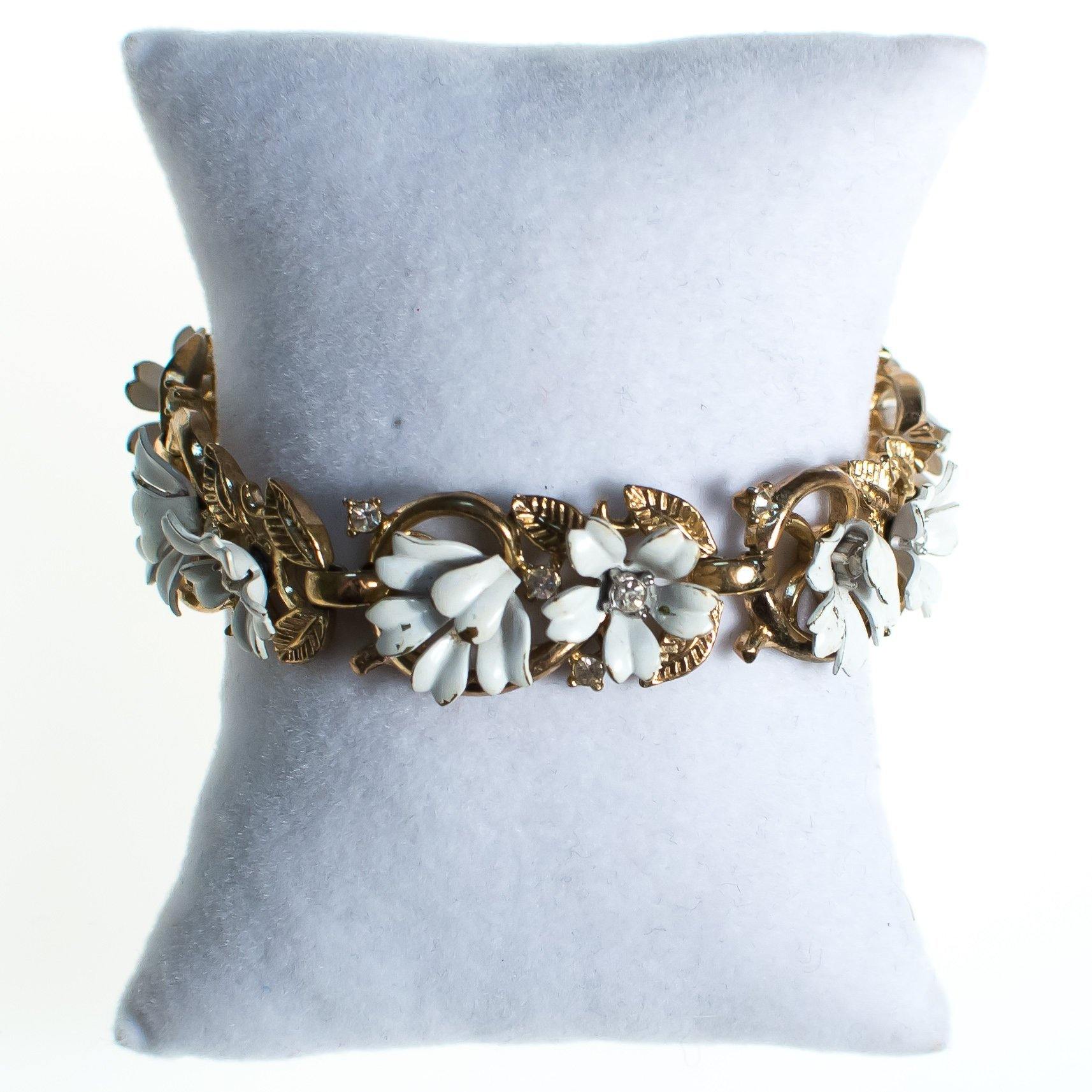 Vintage Crown Trifari White Flower with Rhinestones Bracelet, Gold Tone, White Flowers, CZ, Snap Lock Clasp by 1950s - Vintage Meet Modern Vintage Jewelry - Chicago, Illinois - #oldhollywoodglamour #vintagemeetmodern #designervintage #jewelrybox #antiquejewelry #vintagejewelry