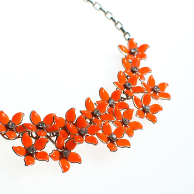 Vintage Orange Thermoset Flower Necklace, Orange Lucite Flowers, Silver Tone Chain, Rhinestones, Fish Hook Clasp by 1950s - Vintage Meet Modern Vintage Jewelry - Chicago, Illinois - #oldhollywoodglamour #vintagemeetmodern #designervintage #jewelrybox #antiquejewelry #vintagejewelry