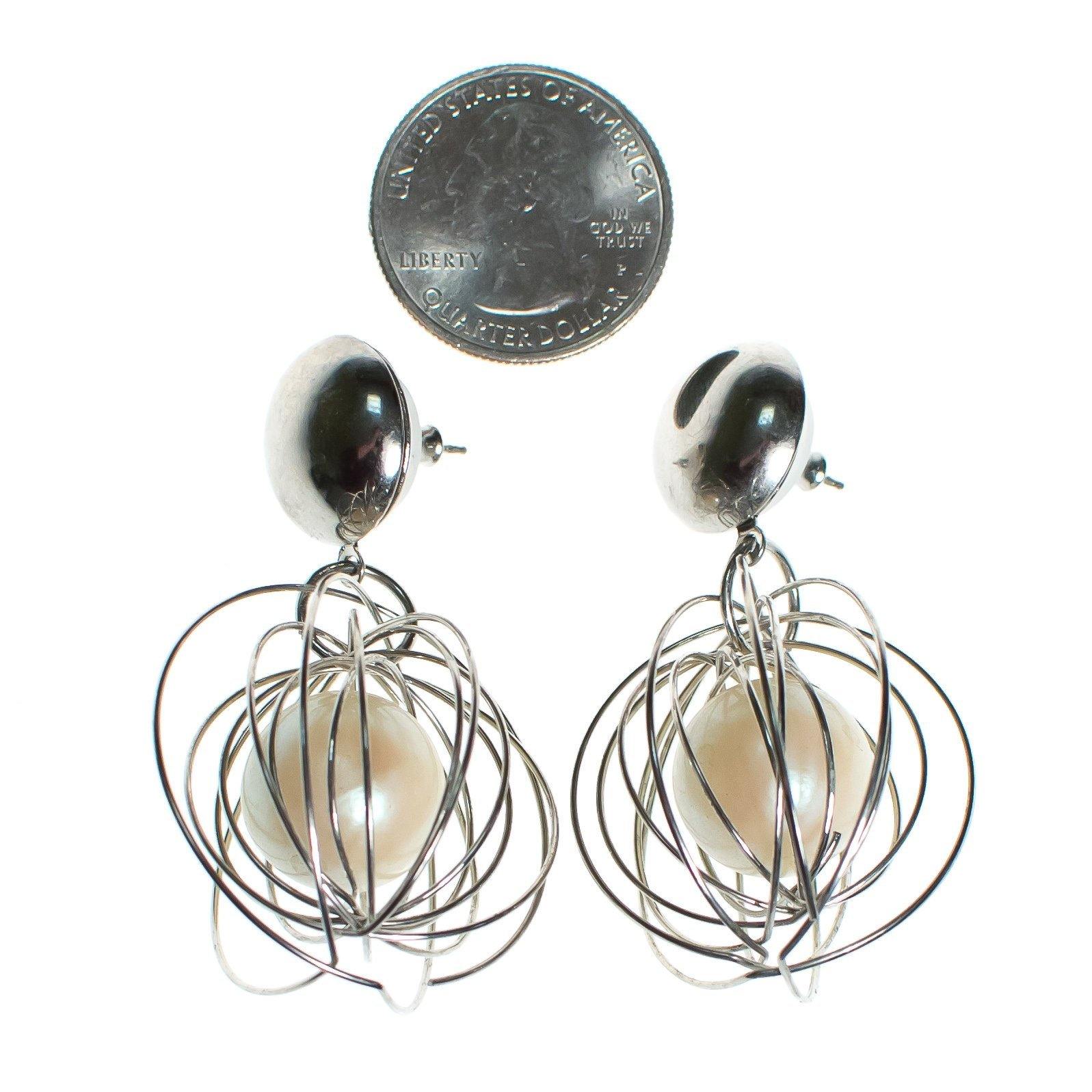 Vintage Mod Silver Caged Pearl Dangling Statement Earrings by 1980s - Vintage Meet Modern Vintage Jewelry - Chicago, Illinois - #oldhollywoodglamour #vintagemeetmodern #designervintage #jewelrybox #antiquejewelry #vintagejewelry
