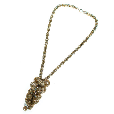 Vintage Gold Filigree Bead and Aurora Borealis Cluster Bead Pendant Necklace by 1960s - Vintage Meet Modern Vintage Jewelry - Chicago, Illinois - #oldhollywoodglamour #vintagemeetmodern #designervintage #jewelrybox #antiquejewelry #vintagejewelry