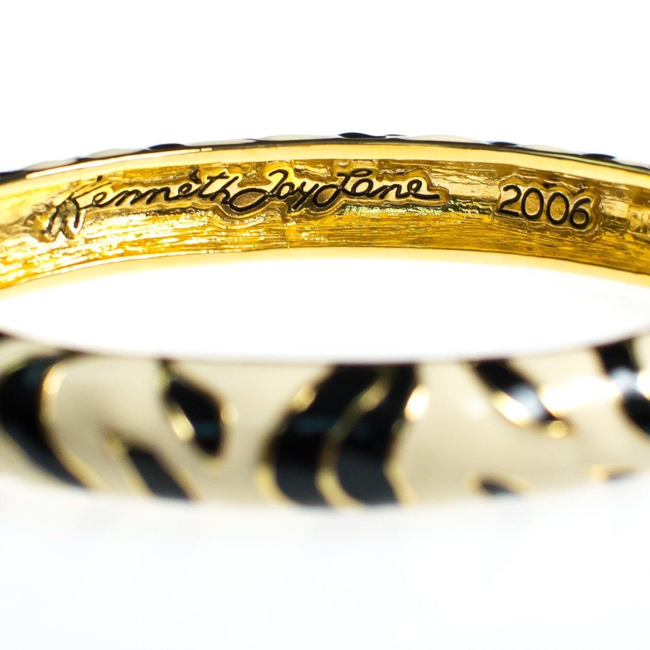 Kenneth Jay Lane Black and White Zebra Bangle Bracelet, Gold Tone by Kenneth Jay Lane - Vintage Meet Modern Vintage Jewelry - Chicago, Illinois - #oldhollywoodglamour #vintagemeetmodern #designervintage #jewelrybox #antiquejewelry #vintagejewelry