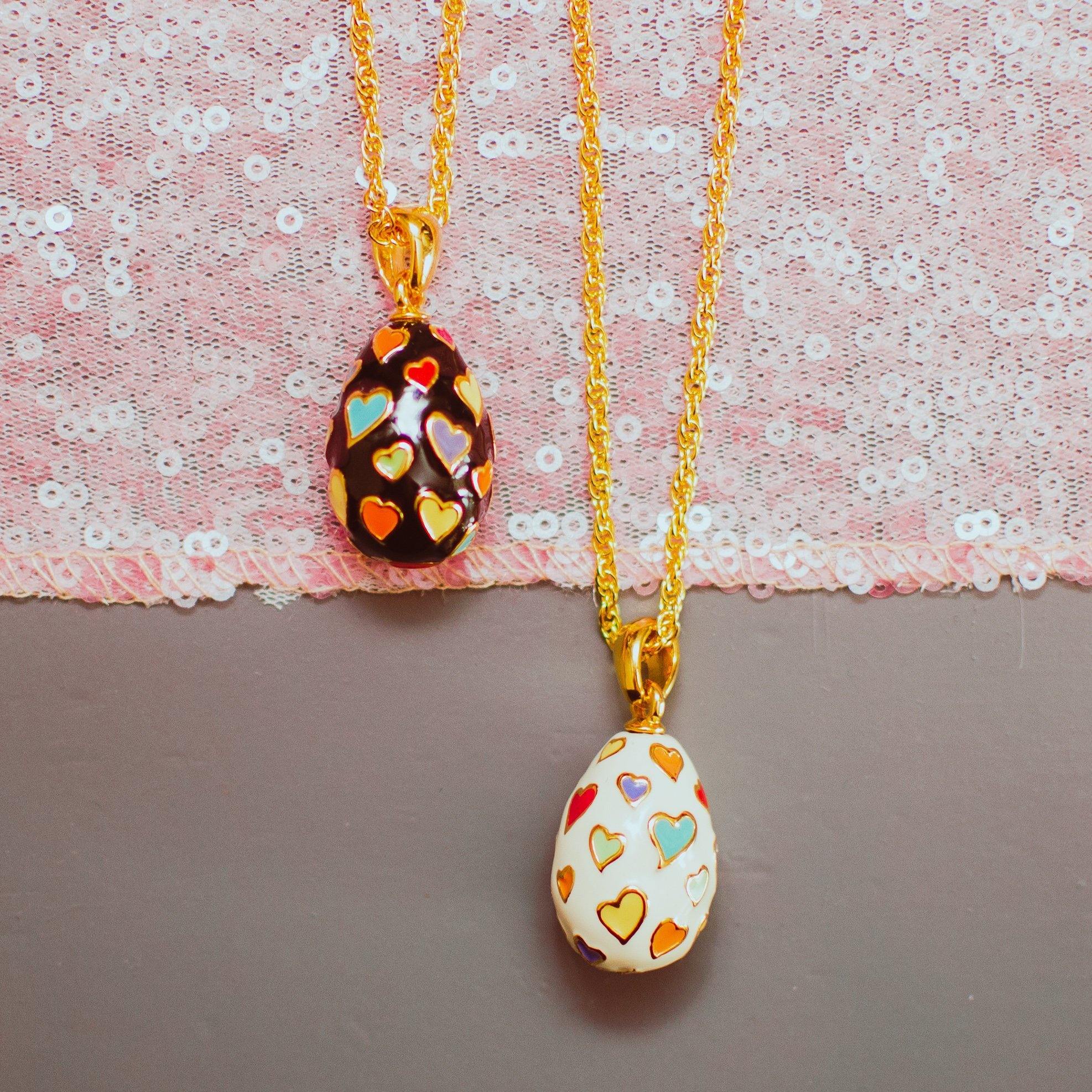 Joan Rivers Heart Imperial Egg Pendant, White Pendant with colorful Hearts, Gold Tone Chain, Lobster Clasp by Joan Rivers - Vintage Meet Modern Vintage Jewelry - Chicago, Illinois - #oldhollywoodglamour #vintagemeetmodern #designervintage #jewelrybox #antiquejewelry #vintagejewelry