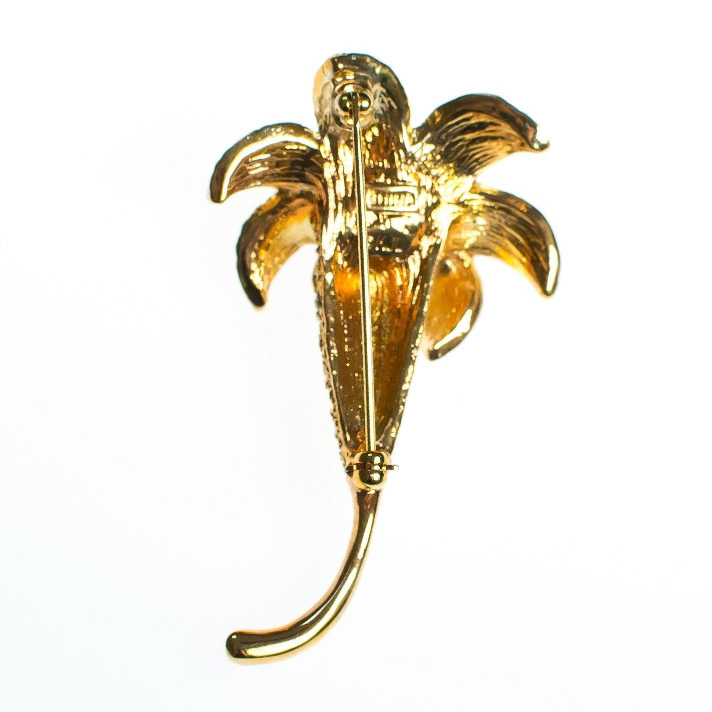 Vintage Kenneth Jay Lane Gilded Lily Flower Brooch, Gold and Silver Tone Setting, Diamante Crystals by Kenneth Jay Lane - Vintage Meet Modern Vintage Jewelry - Chicago, Illinois - #oldhollywoodglamour #vintagemeetmodern #designervintage #jewelrybox #antiquejewelry #vintagejewelry
