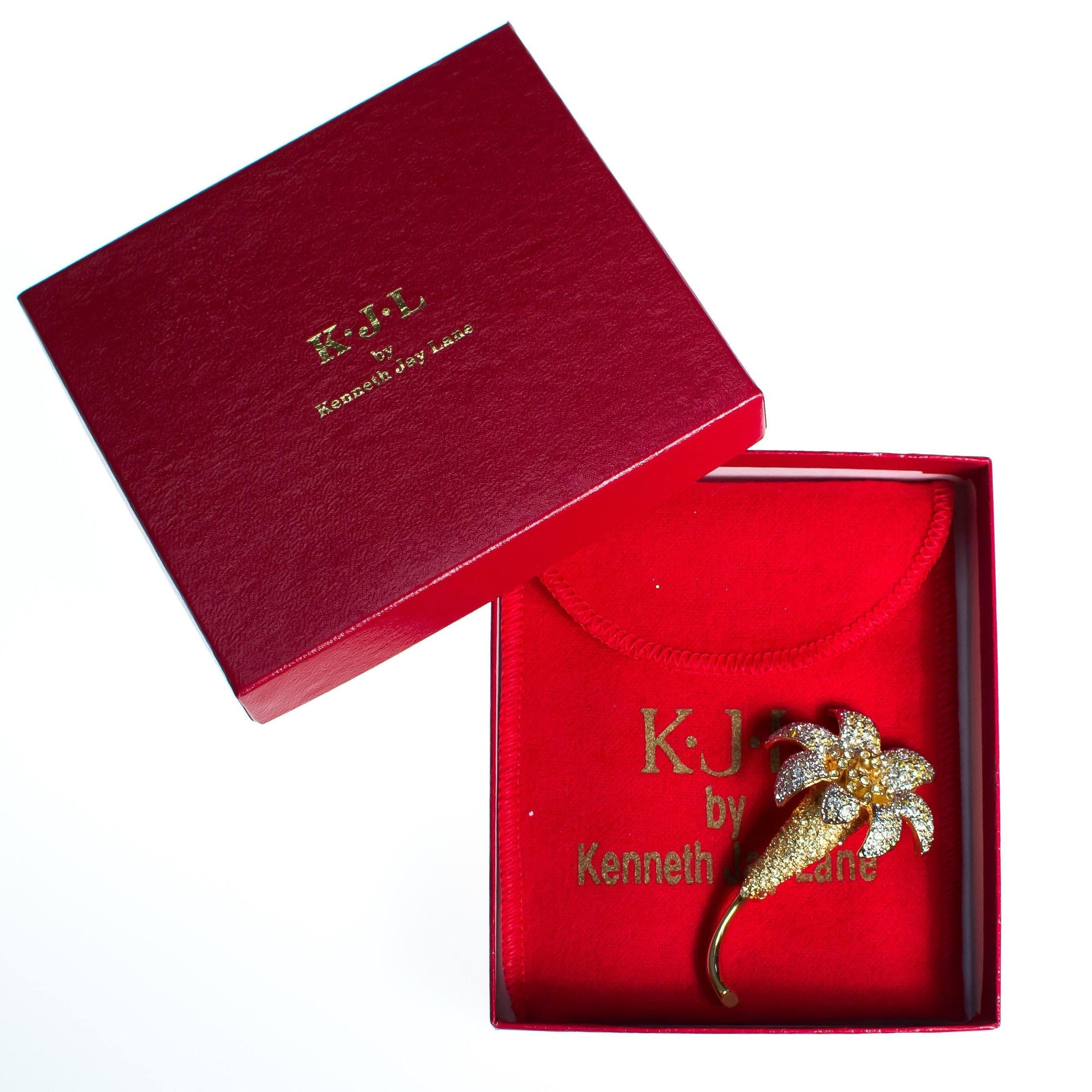 Vintage Kenneth Jay Lane Gilded Lily Flower Brooch, Gold and Silver Tone Setting, Diamante Crystals by Kenneth Jay Lane - Vintage Meet Modern Vintage Jewelry - Chicago, Illinois - #oldhollywoodglamour #vintagemeetmodern #designervintage #jewelrybox #antiquejewelry #vintagejewelry