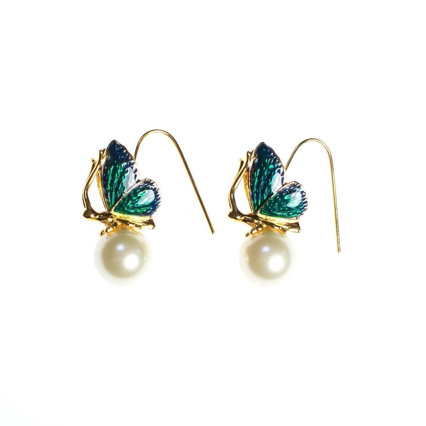 Vintage Kenneth Jay Lane Butterfly with Pearl Statement Earrings Wire Pierced by Kenneth Jay Lane - Vintage Meet Modern Vintage Jewelry - Chicago, Illinois - #oldhollywoodglamour #vintagemeetmodern #designervintage #jewelrybox #antiquejewelry #vintagejewelry