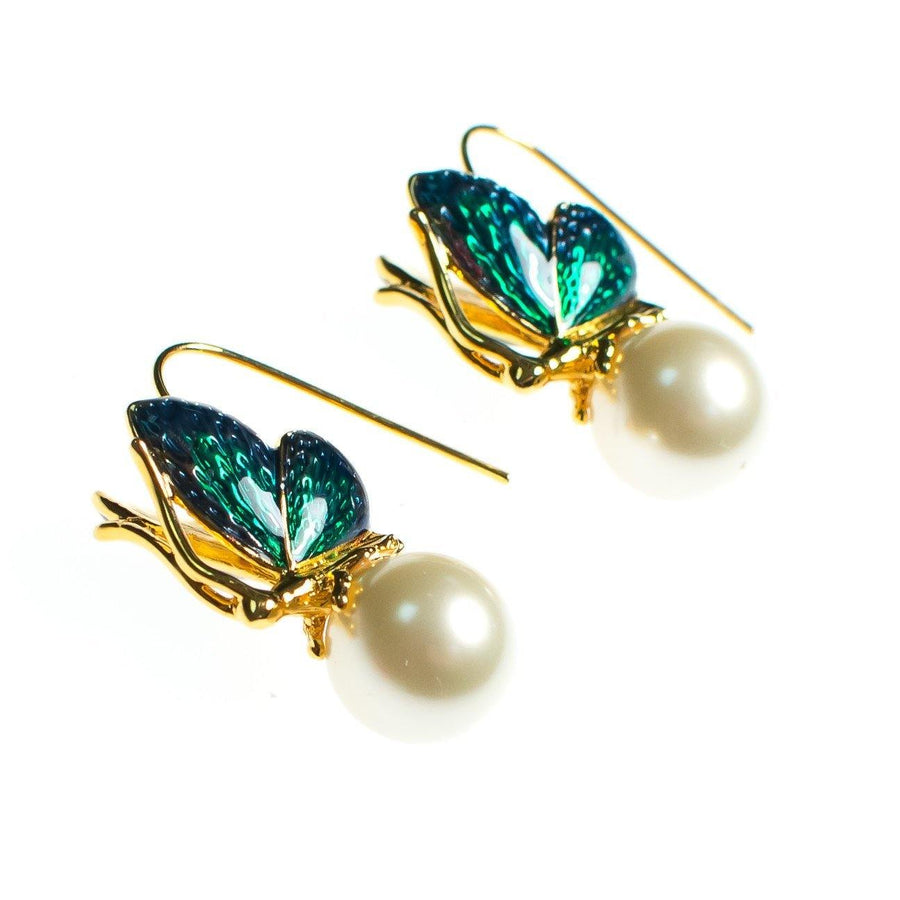 Vintage Kenneth Jay Lane Butterfly with Pearl Statement Earrings Wire Pierced by Kenneth Jay Lane - Vintage Meet Modern Vintage Jewelry - Chicago, Illinois - #oldhollywoodglamour #vintagemeetmodern #designervintage #jewelrybox #antiquejewelry #vintagejewelry
