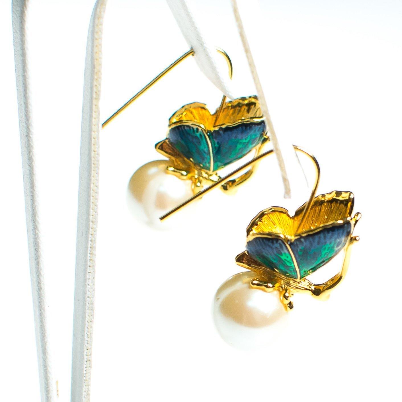 Vintage Kenneth Jay Lane Butterfly with Pearl Statement Earrings Wire Pierced by Kenneth Jay Lane - Vintage Meet Modern Vintage Jewelry - Chicago, Illinois - #oldhollywoodglamour #vintagemeetmodern #designervintage #jewelrybox #antiquejewelry #vintagejewelry