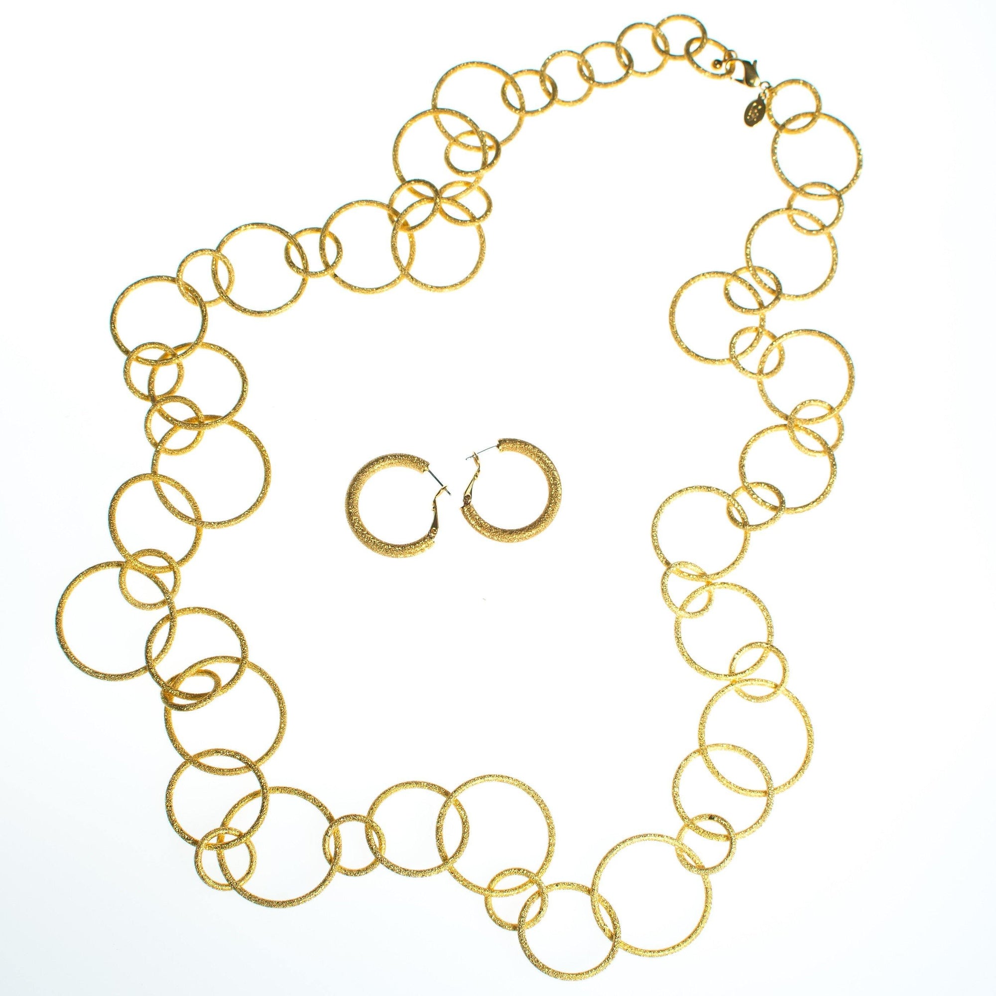 Vintage Joan Rivers Brushed Gold Large Circular Link Necklace and Hoop Earrings Set, Gold Tone Setting, Pierced, Lobster Claw Clasp by Joan Rivers - Vintage Meet Modern Vintage Jewelry - Chicago, Illinois - #oldhollywoodglamour #vintagemeetmodern #designervintage #jewelrybox #antiquejewelry #vintagejewelry