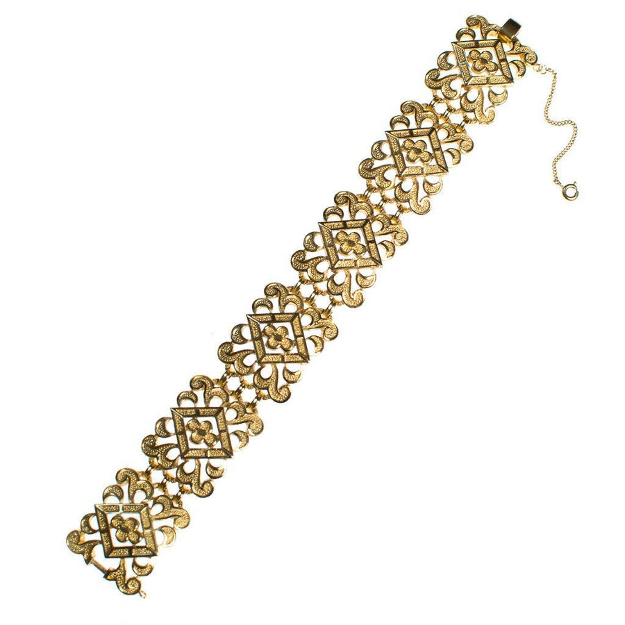 Vintage Crown Trifari Wide Scroll Link Gold Panel Bracelet by Crown Trifari - Vintage Meet Modern Vintage Jewelry - Chicago, Illinois - #oldhollywoodglamour #vintagemeetmodern #designervintage #jewelrybox #antiquejewelry #vintagejewelry