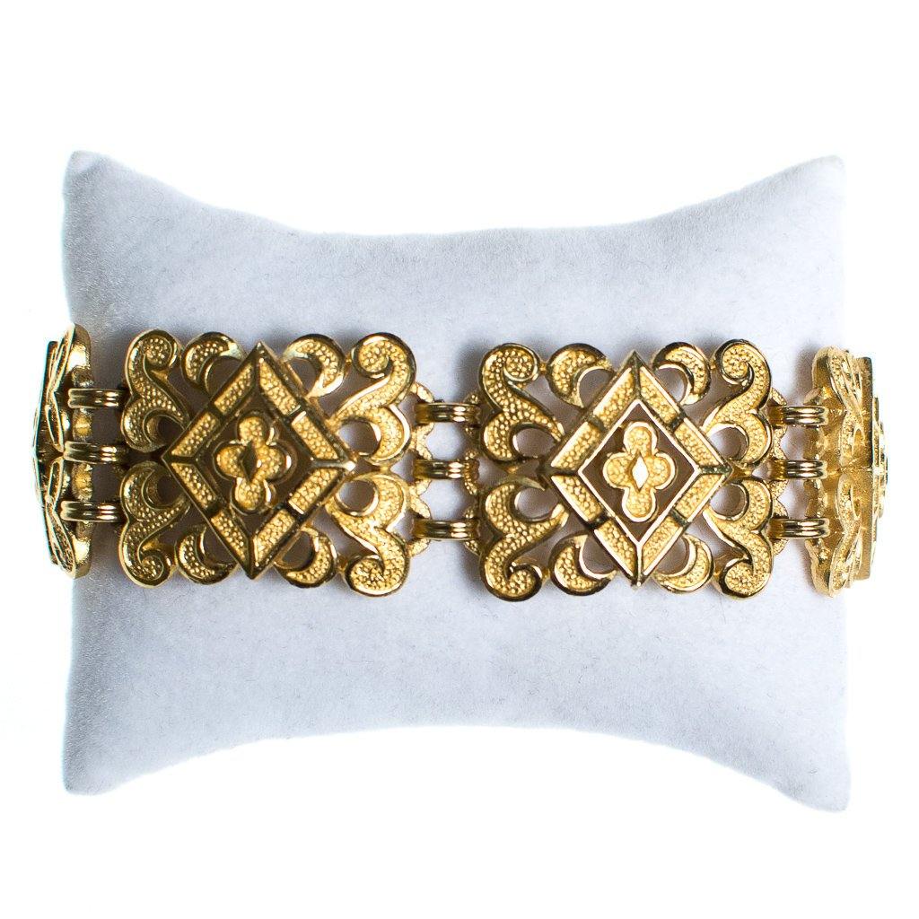 Vintage Crown Trifari Wide Scroll Link Gold Panel Bracelet by Crown Trifari - Vintage Meet Modern Vintage Jewelry - Chicago, Illinois - #oldhollywoodglamour #vintagemeetmodern #designervintage #jewelrybox #antiquejewelry #vintagejewelry