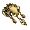 Vintage ART Signed Yellow Cats Eye Cabochon and Amber Rhinestone Dangling Charm Brooch with Orange and Yellow Painted Enamel Daisies by ART - Vintage Meet Modern Vintage Jewelry - Chicago, Illinois - #oldhollywoodglamour #vintagemeetmodern #designervintage #jewelrybox #antiquejewelry #vintagejewelry