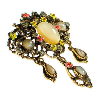 Vintage ART Signed Yellow Cats Eye Cabochon and Amber Rhinestone Dangling Charm Brooch with Orange and Yellow Painted Enamel Daisies by ART - Vintage Meet Modern Vintage Jewelry - Chicago, Illinois - #oldhollywoodglamour #vintagemeetmodern #designervintage #jewelrybox #antiquejewelry #vintagejewelry