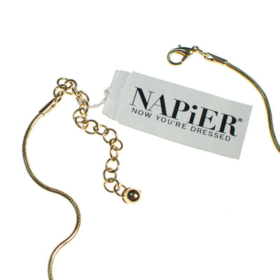 Vintage 1980s Napier Modernist Gold Cross Pendant Necklace, Pendant with Diamante Crystal, Gold Tone Rope Chain, Lobster Claw Clasp by Napier - Vintage Meet Modern Vintage Jewelry - Chicago, Illinois - #oldhollywoodglamour #vintagemeetmodern #designervintage #jewelrybox #antiquejewelry #vintagejewelry
