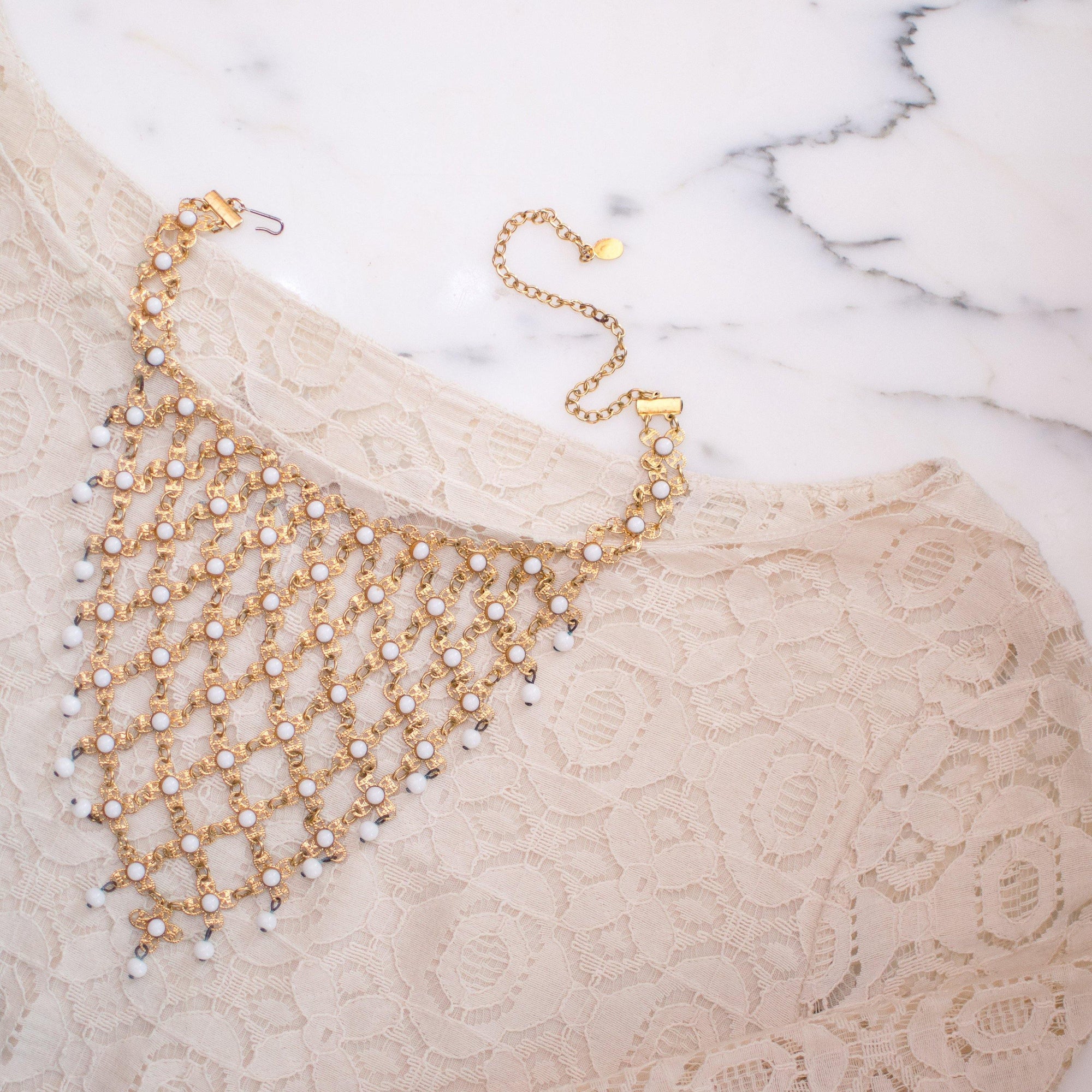 Vintage Huge Gold Filigree and White Milk Glass Bead Bib Statement Necklace by 1960s - Vintage Meet Modern Vintage Jewelry - Chicago, Illinois - #oldhollywoodglamour #vintagemeetmodern #designervintage #jewelrybox #antiquejewelry #vintagejewelry