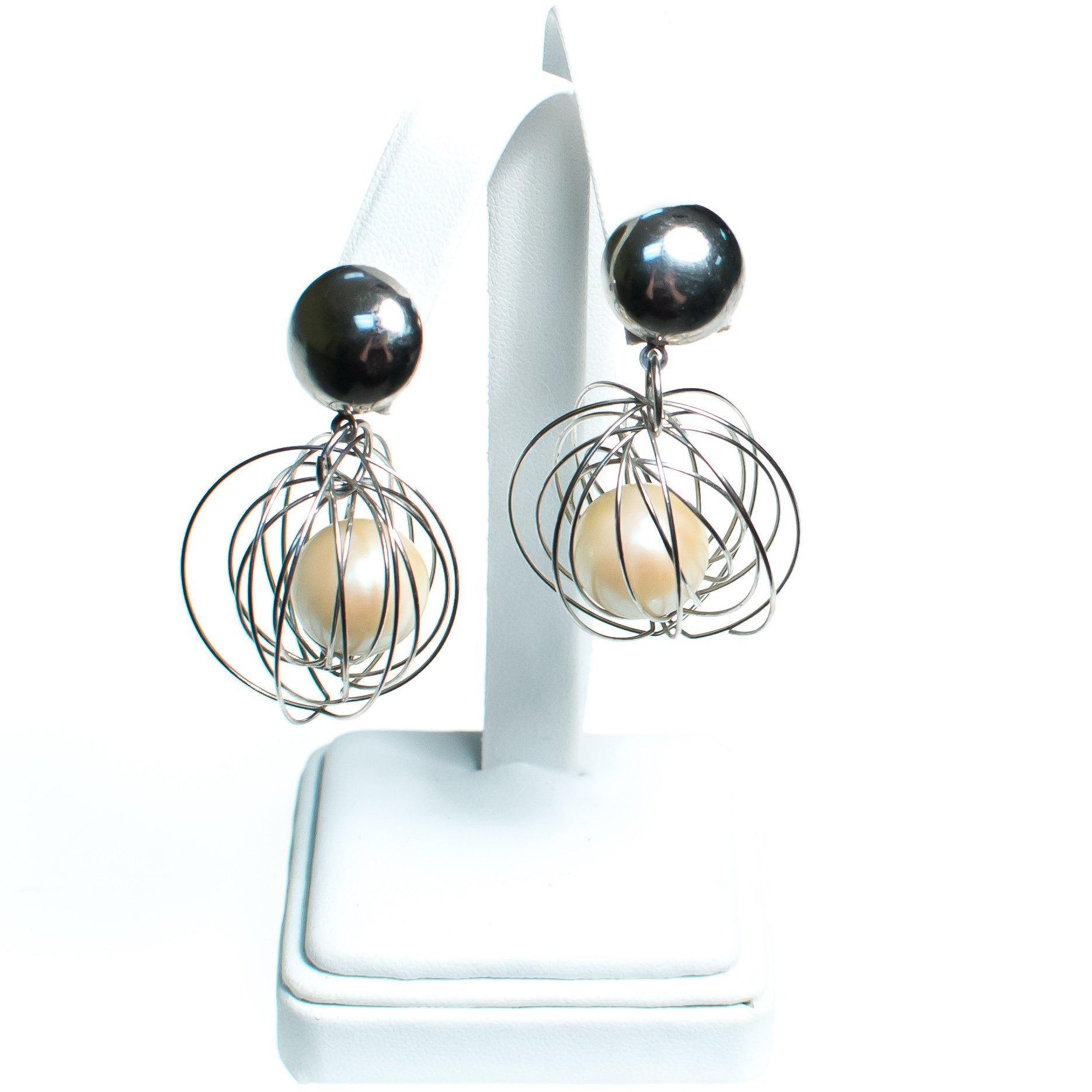 Vintage Mod Silver Caged Pearl Dangling Statement Earrings by 1980s - Vintage Meet Modern Vintage Jewelry - Chicago, Illinois - #oldhollywoodglamour #vintagemeetmodern #designervintage #jewelrybox #antiquejewelry #vintagejewelry