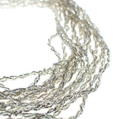 Vintage Made in Japan Silver Glitter Bead Multi Strand Torsade Necklace by Made in Japan - Vintage Meet Modern Vintage Jewelry - Chicago, Illinois - #oldhollywoodglamour #vintagemeetmodern #designervintage #jewelrybox #antiquejewelry #vintagejewelry