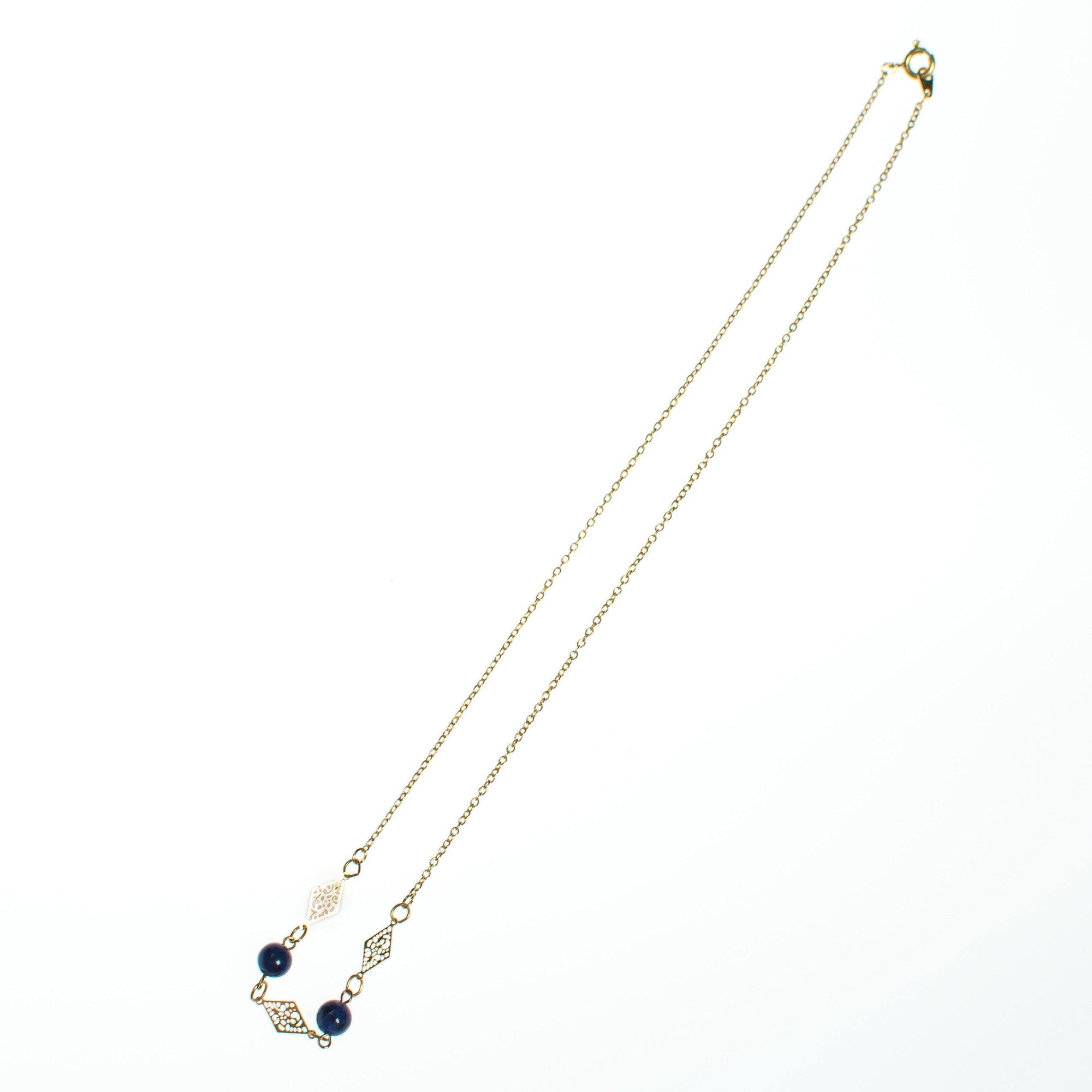 Vintage 1970s Minimalist Lapis and Gold Filigree Geometric Station Necklace by 1970s - Vintage Meet Modern Vintage Jewelry - Chicago, Illinois - #oldhollywoodglamour #vintagemeetmodern #designervintage #jewelrybox #antiquejewelry #vintagejewelry