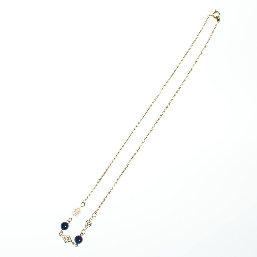 Vintage 1970s Minimalist Lapis and Gold Filigree Geometric Station Necklace by 1970s - Vintage Meet Modern Vintage Jewelry - Chicago, Illinois - #oldhollywoodglamour #vintagemeetmodern #designervintage #jewelrybox #antiquejewelry #vintagejewelry