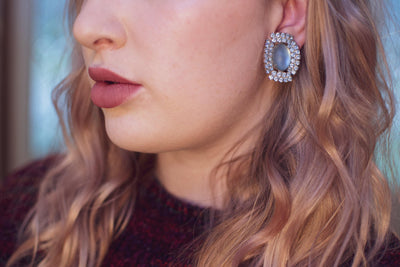 Vintage 1950s Retro Glam Frosted Cinderella Blue Rhinestone Statement Earrings, Clip On by 1950s - Vintage Meet Modern Vintage Jewelry - Chicago, Illinois - #oldhollywoodglamour #vintagemeetmodern #designervintage #jewelrybox #antiquejewelry #vintagejewelry