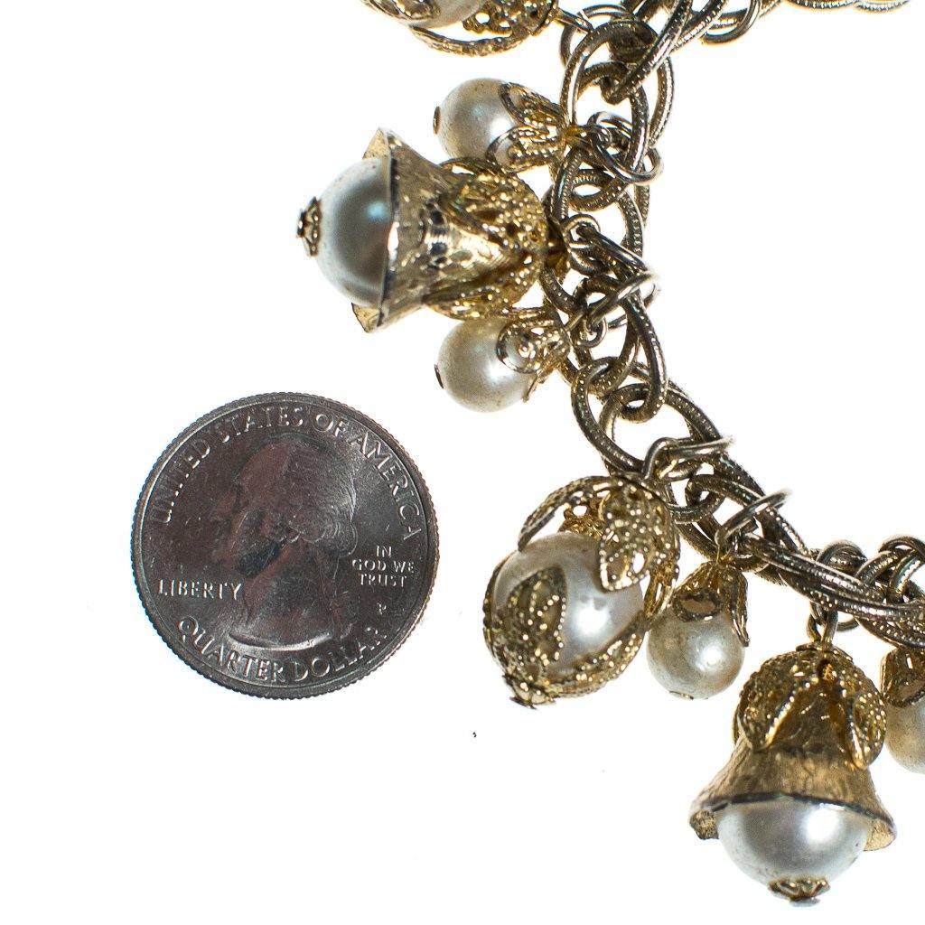 Vintage Mid Century Modern Gold Filigree and Pearl Charm Bracelet by 1960s - Vintage Meet Modern Vintage Jewelry - Chicago, Illinois - #oldhollywoodglamour #vintagemeetmodern #designervintage #jewelrybox #antiquejewelry #vintagejewelry