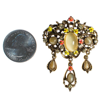 Vintage ART Signed Yellow Cats Eye Cabochon and Amber Rhinestone Dangling Charm Brooch with Orange and Yellow Painted Enamel Daisies by ART - Vintage Meet Modern Vintage Jewelry - Chicago, Illinois - #oldhollywoodglamour #vintagemeetmodern #designervintage #jewelrybox #antiquejewelry #vintagejewelry