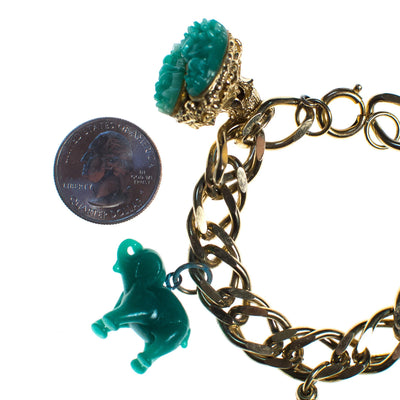 Vintage 1940s Made in Germany Chunky Charm Bracelet with Faux Emerald Jade Glass Elephant and Floral Charms by 1940s - Vintage Meet Modern Vintage Jewelry - Chicago, Illinois - #oldhollywoodglamour #vintagemeetmodern #designervintage #jewelrybox #antiquejewelry #vintagejewelry
