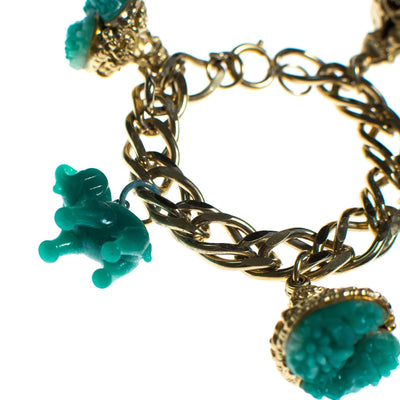 Vintage 1940s Made in Germany Chunky Charm Bracelet with Faux Emerald Jade Glass Elephant and Floral Charms by 1940s - Vintage Meet Modern Vintage Jewelry - Chicago, Illinois - #oldhollywoodglamour #vintagemeetmodern #designervintage #jewelrybox #antiquejewelry #vintagejewelry