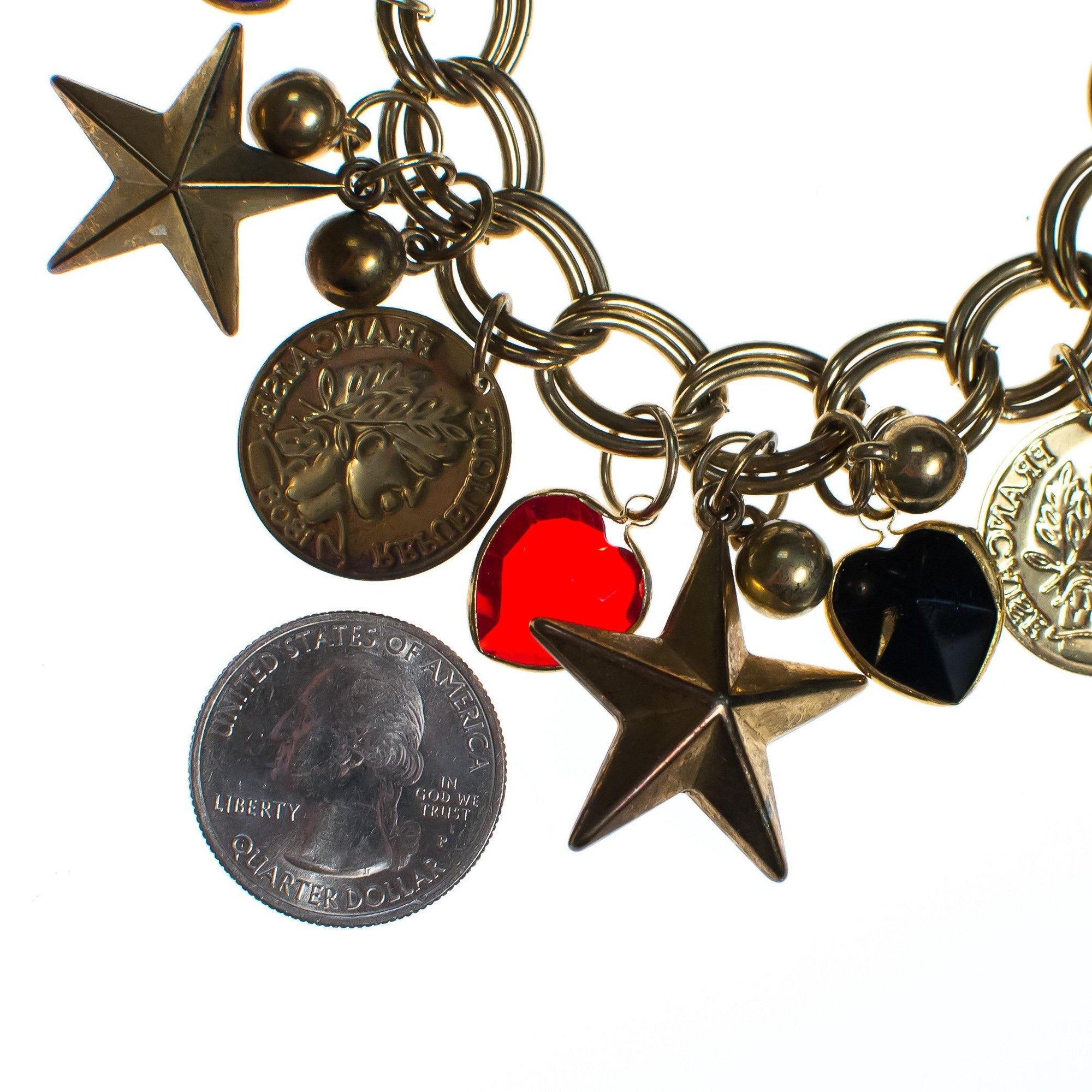 Vintage Mid Century Modern Chunky Charm Bracelet with Stars, Coins, Blue, Green, and Red Crystal Hearts by 1950s - Vintage Meet Modern Vintage Jewelry - Chicago, Illinois - #oldhollywoodglamour #vintagemeetmodern #designervintage #jewelrybox #antiquejewelry #vintagejewelry