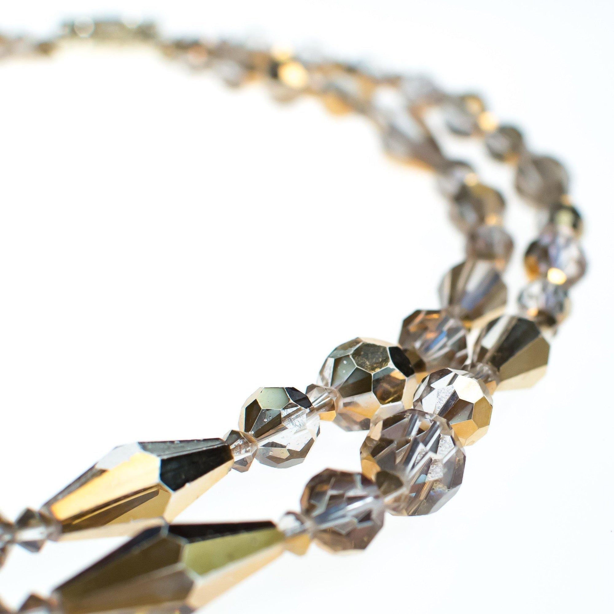 Vintage Champagne Gold Aurora Borealis Double Strand Faceted Crystal Necklace by 1950s - Vintage Meet Modern Vintage Jewelry - Chicago, Illinois - #oldhollywoodglamour #vintagemeetmodern #designervintage #jewelrybox #antiquejewelry #vintagejewelry