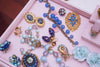 Vintage 1940s Made in Germany Blue Marble Glass Bracelet with Pink Leaves by Germany - Vintage Meet Modern Vintage Jewelry - Chicago, Illinois - #oldhollywoodglamour #vintagemeetmodern #designervintage #jewelrybox #antiquejewelry #vintagejewelry