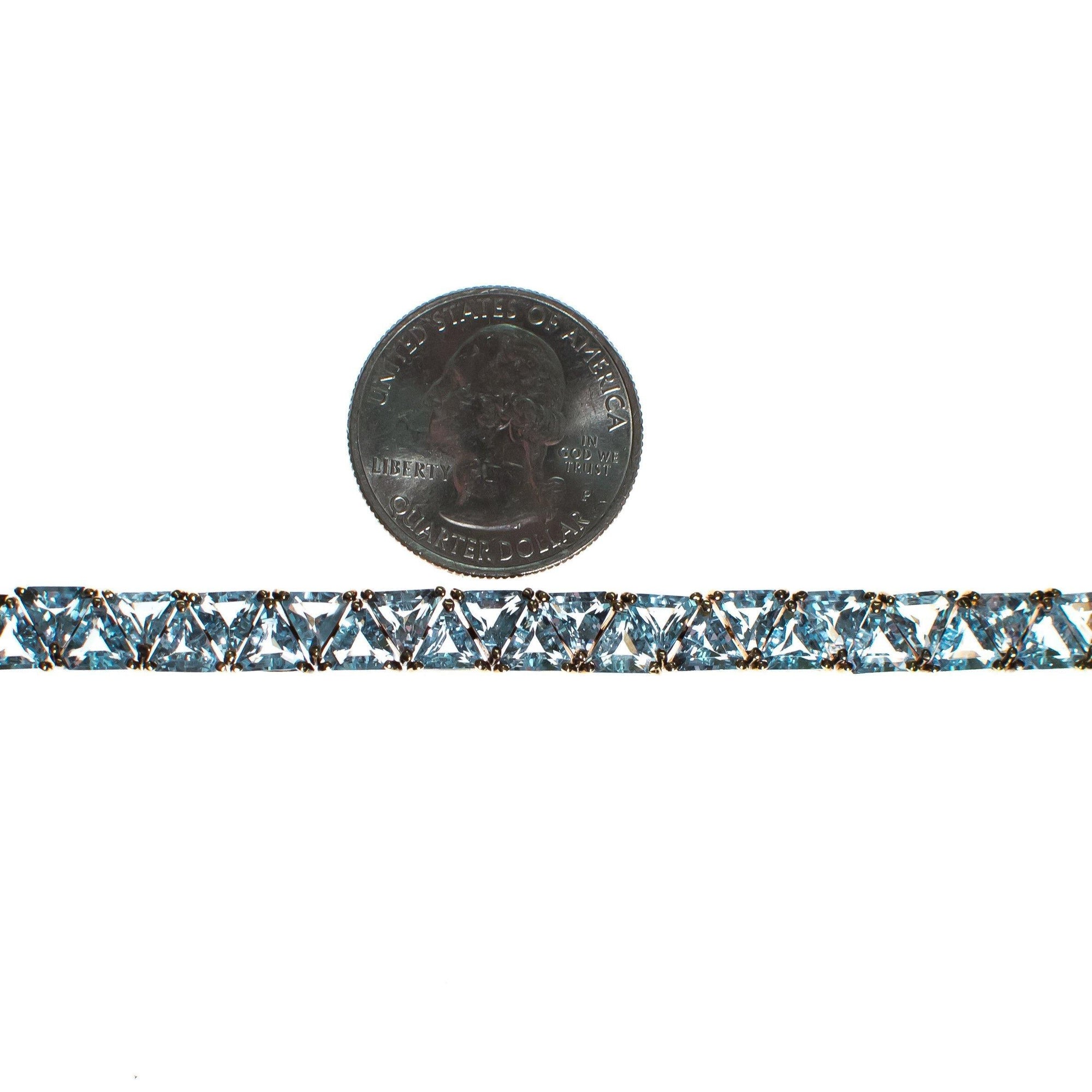 Vintage Suzanne Somers  Blue Topaz Trillion CZ Cut 18kt Gold Over Sterling Silver Tennis Bracelet by Suzanne Somers - Vintage Meet Modern Vintage Jewelry - Chicago, Illinois - #oldhollywoodglamour #vintagemeetmodern #designervintage #jewelrybox #antiquejewelry #vintagejewelry