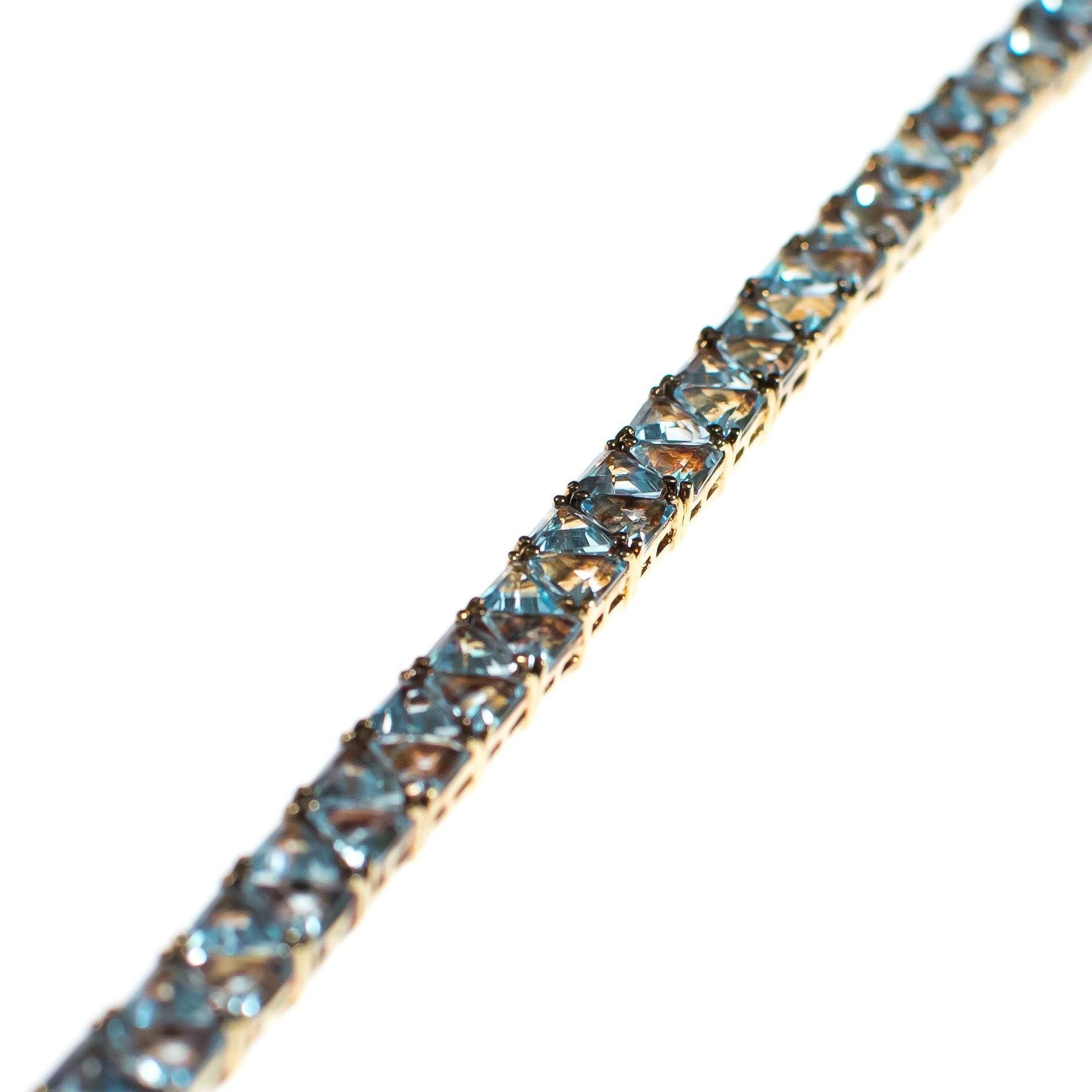 Vintage Suzanne Somers  Blue Topaz Trillion CZ Cut 18kt Gold Over Sterling Silver Tennis Bracelet by Suzanne Somers - Vintage Meet Modern Vintage Jewelry - Chicago, Illinois - #oldhollywoodglamour #vintagemeetmodern #designervintage #jewelrybox #antiquejewelry #vintagejewelry