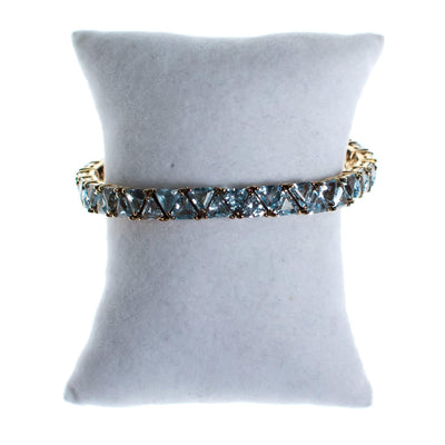 Vintage Suzanne Somers  Blue Topaz Trillion CZ Cut 18kt Gold Over Sterling Silver Tennis Bracelet by Suzanne Somers - Vintage Meet Modern Vintage Jewelry - Chicago, Illinois - #oldhollywoodglamour #vintagemeetmodern #designervintage #jewelrybox #antiquejewelry #vintagejewelry