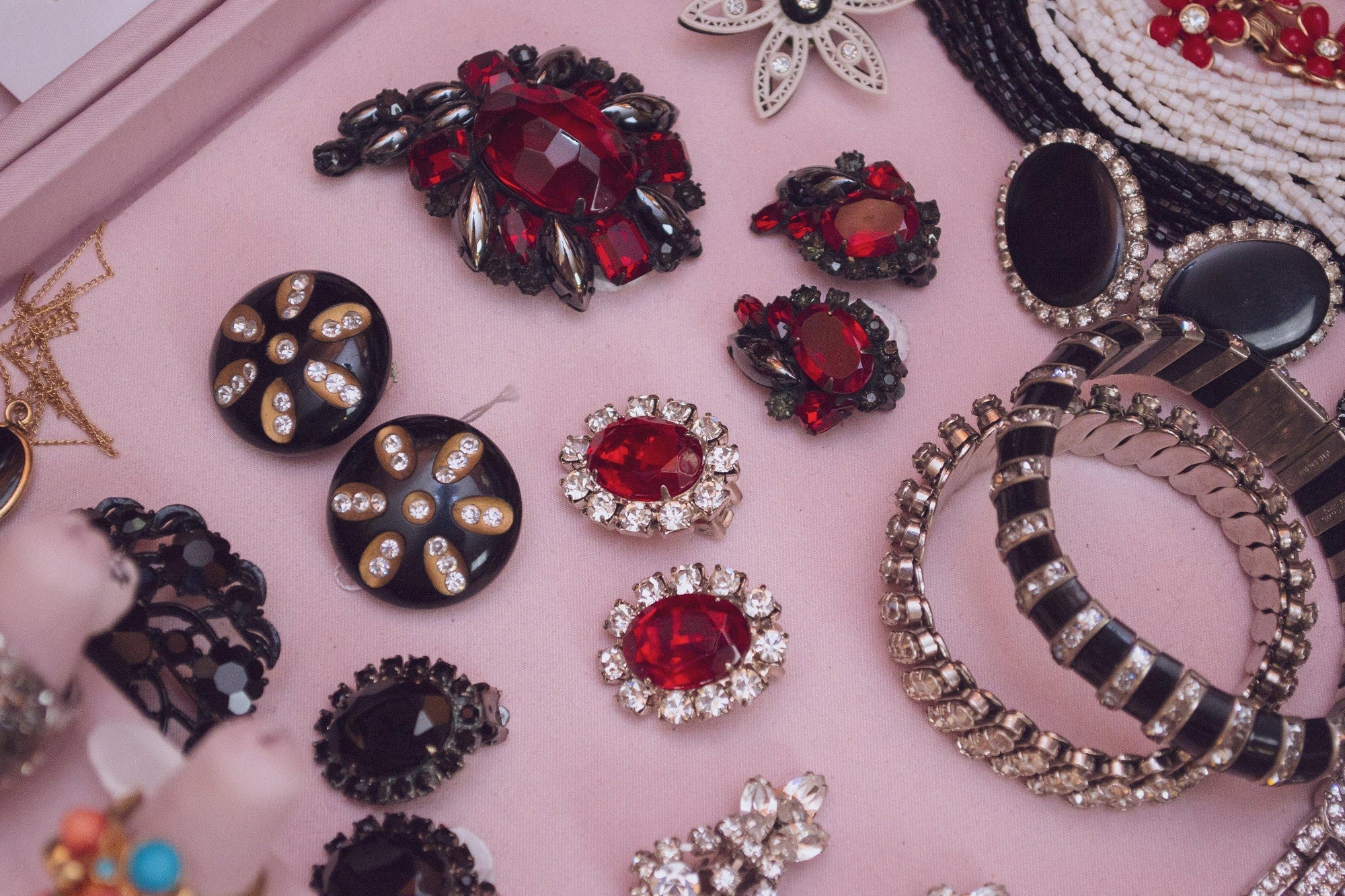 Vintage Weiss Hematite Jet and Red Crystal Rhinestone Brooch by Weiss - Vintage Meet Modern Vintage Jewelry - Chicago, Illinois - #oldhollywoodglamour #vintagemeetmodern #designervintage #jewelrybox #antiquejewelry #vintagejewelry