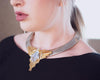 Vintage 1980s Art Deco Inspired Steampunk Collar Necklace in Silver with Gold Accented and Carved Geometric Crystal by 1980s - Vintage Meet Modern Vintage Jewelry - Chicago, Illinois - #oldhollywoodglamour #vintagemeetmodern #designervintage #jewelrybox #antiquejewelry #vintagejewelry