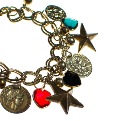 Vintage Mid Century Modern Chunky Charm Bracelet with Stars, Coins, Blue, Green, and Red Crystal Hearts by 1950s - Vintage Meet Modern Vintage Jewelry - Chicago, Illinois - #oldhollywoodglamour #vintagemeetmodern #designervintage #jewelrybox #antiquejewelry #vintagejewelry