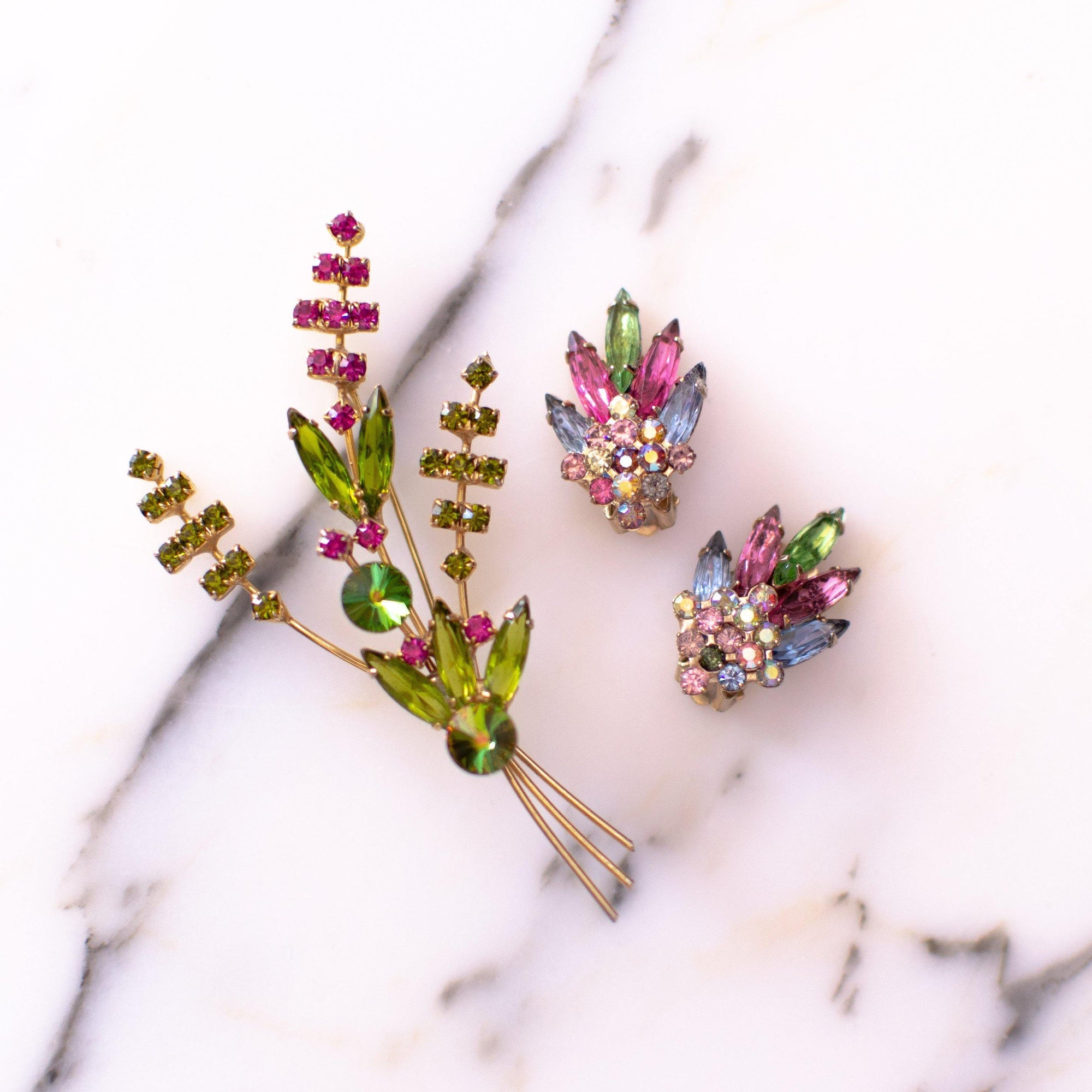 Vintage Made in Austria Bright Aurora Borealis Green and Pink Rhinestone Flower Brooch by Made in Austria - Vintage Meet Modern Vintage Jewelry - Chicago, Illinois - #oldhollywoodglamour #vintagemeetmodern #designervintage #jewelrybox #antiquejewelry #vintagejewelry