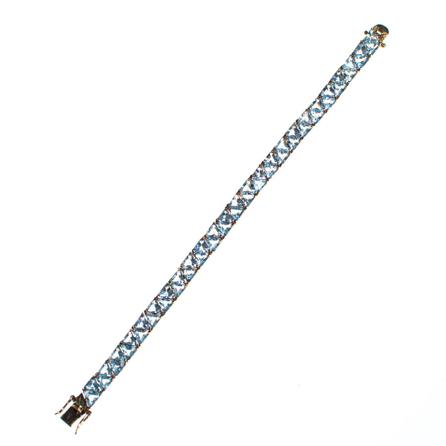 Vintage Suzanne Somers  Blue Topaz Trillion CZ Cut 18kt Gold Over Sterling Silver Tennis Bracelet by Suzanne Somers - Vintage Meet Modern Vintage Jewelry - Chicago, Illinois - #oldhollywoodglamour #vintagemeetmodern #designervintage #jewelrybox #antiquejewelry #vintagejewelry