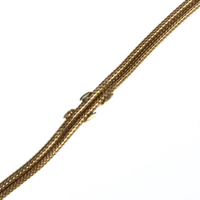 Vintage Christian Dior Bracelet, Gold Tone, Spring Ring Clasp by Christian Dior - Vintage Meet Modern Vintage Jewelry - Chicago, Illinois - #oldhollywoodglamour #vintagemeetmodern #designervintage #jewelrybox #antiquejewelry #vintagejewelry