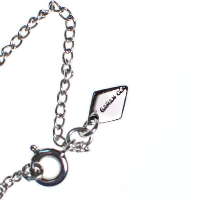 Vintage Sarah Coventry Petite Diamante Rhinestone Starburst Pendant Necklace by Sarah Coventry - Vintage Meet Modern Vintage Jewelry - Chicago, Illinois - #oldhollywoodglamour #vintagemeetmodern #designervintage #jewelrybox #antiquejewelry #vintagejewelry